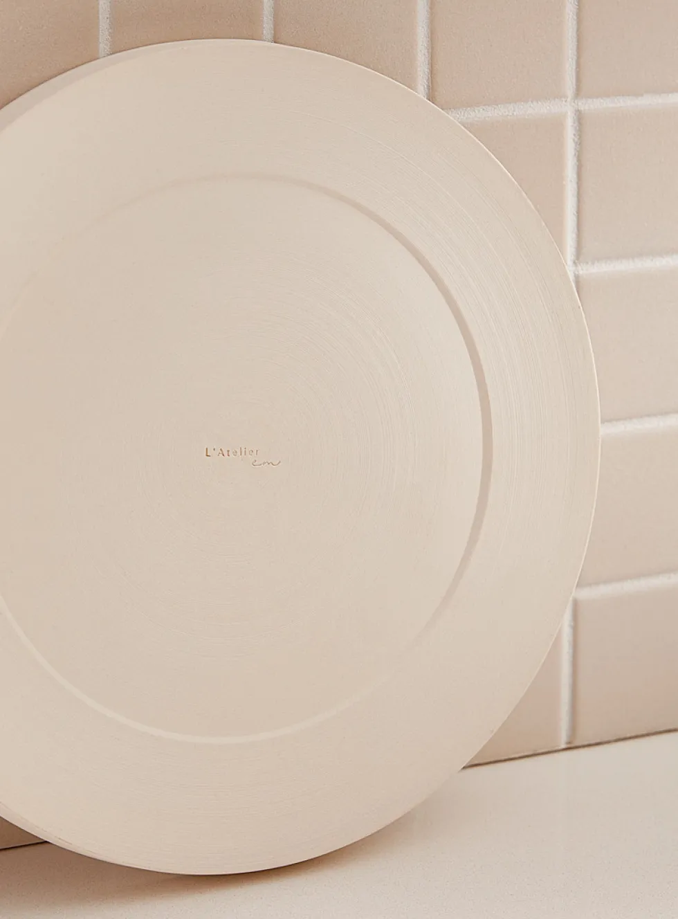 Large white glazed ceramic plate
