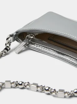 Le Petit Bisou chrome handbag