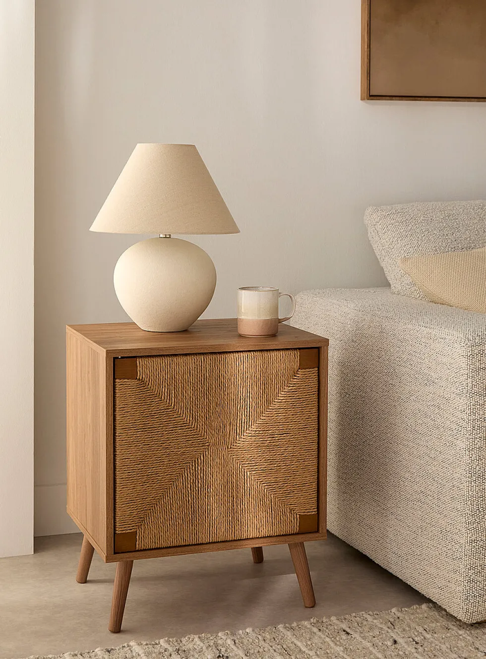 Light walnut finish woven door accent table