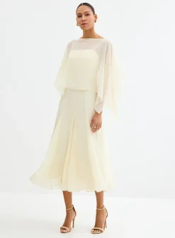Long vanilla white flowy dress with cape
