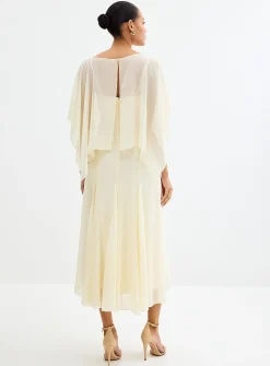 Long vanilla white flowy dress with cape