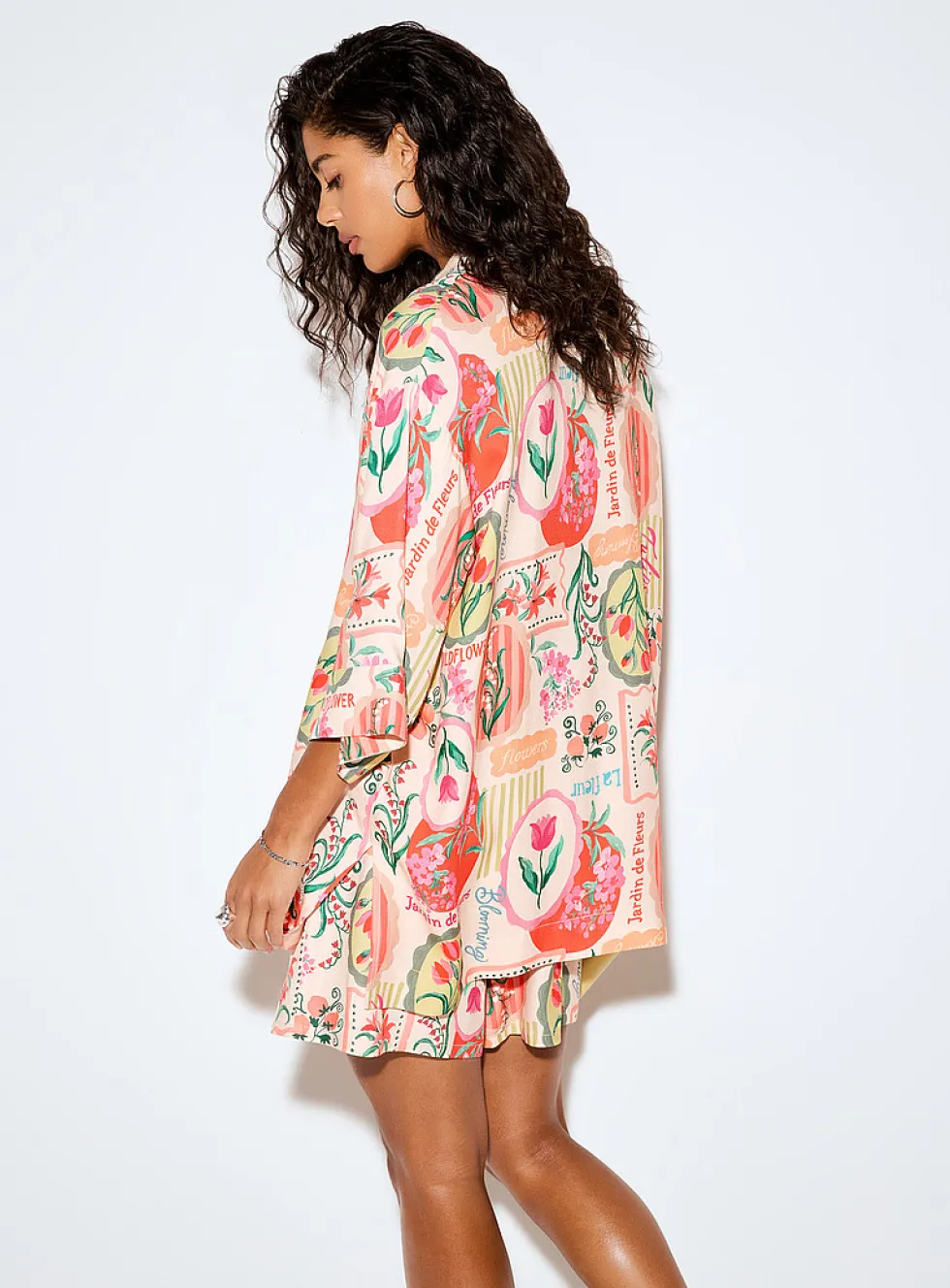 Loose elongated printed blouse