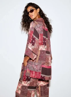 Loose elongated printed blouse
