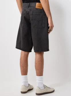 Loose medium-blue jean short