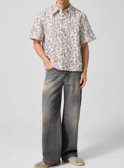 Mass distressed faded wide-leg jean