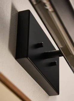 Matte black iron wall sconce