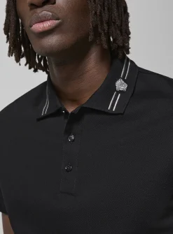 Medusa embroidered collar polo shirt