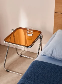 Metal and polyethylene folding accent table