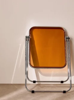 Metal and polyethylene folding accent table