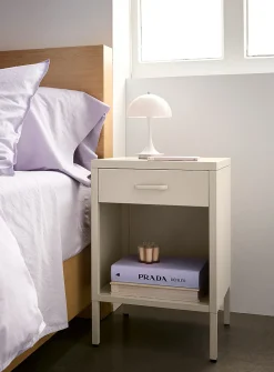 Metal bedside table with legs