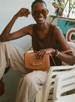 Metal buckle leather saddle bag