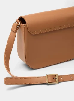 Metal buckle leather saddle bag