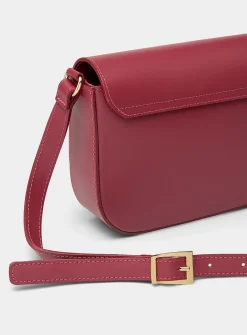 Metal buckle leather saddle bag