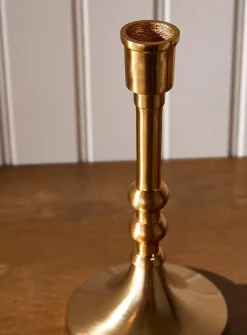 Metallic candle holder