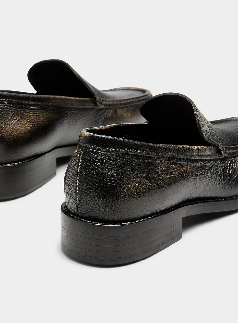 Metallized letter distressed leather loafers