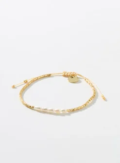 Mini-bead and pearl cord bracelet