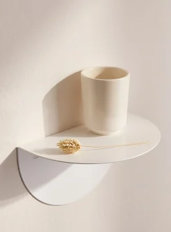 Minimalist half-moon wall shelf