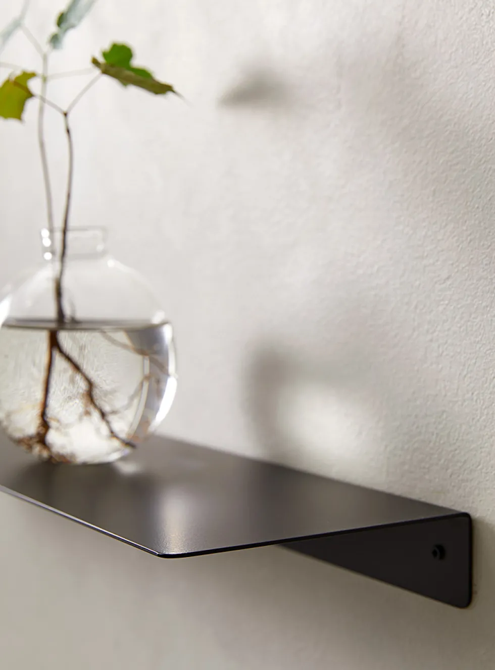 Minimalist steel wall shelf