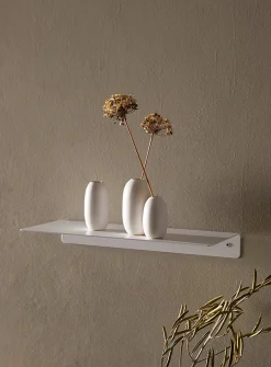 Minimalist steel wall shelf