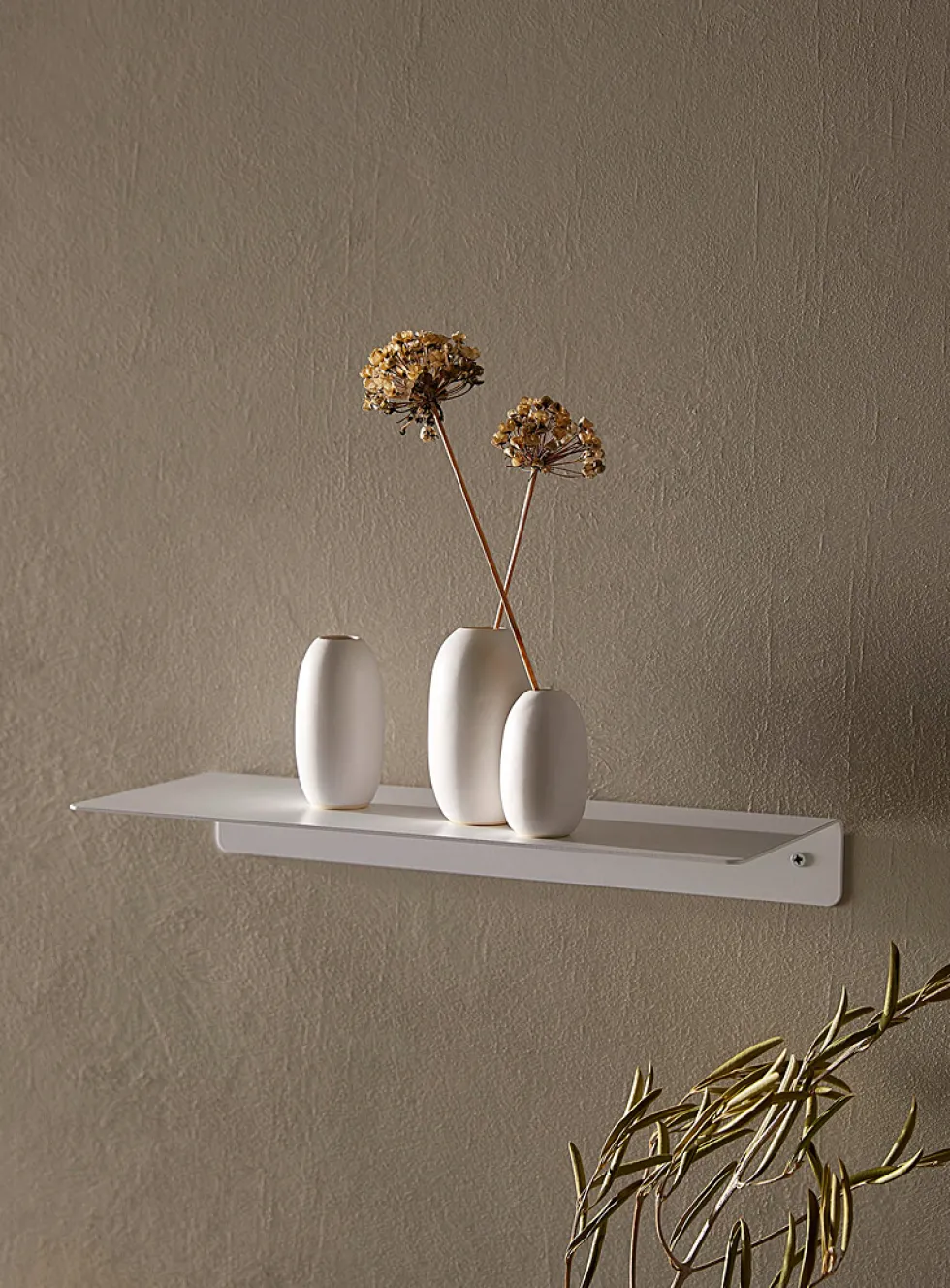 Minimalist steel wall shelf