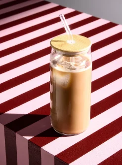 Minimalist tall glass with straw