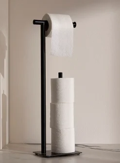 Minimalist toilet paper holder with reserve