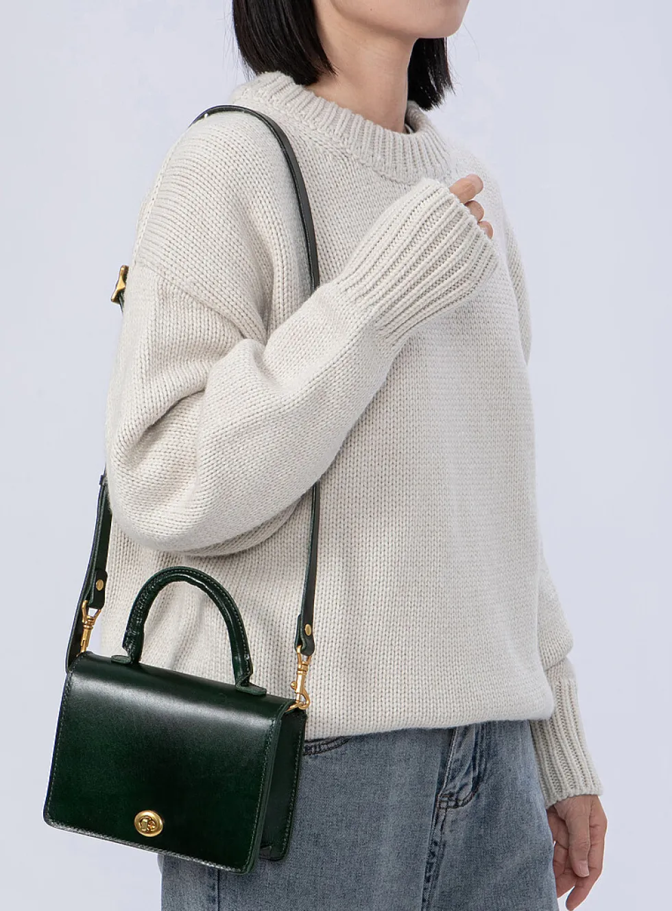 Minimalist Turn-loc closure handbag