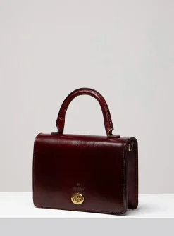 Minimalist Turn-loc closure handbag