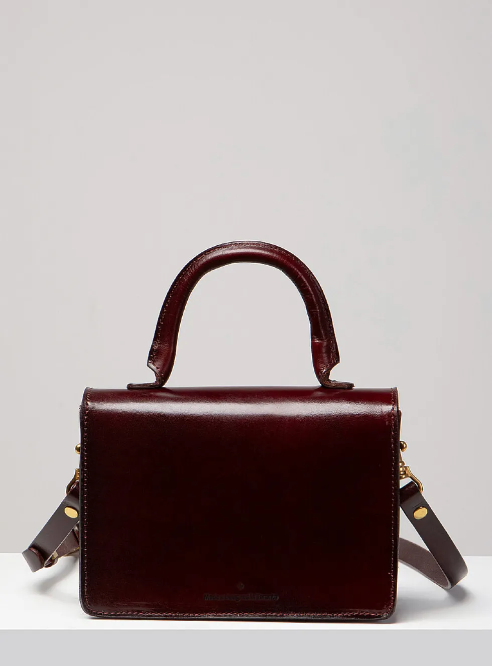 Minimalist Turn-loc closure handbag