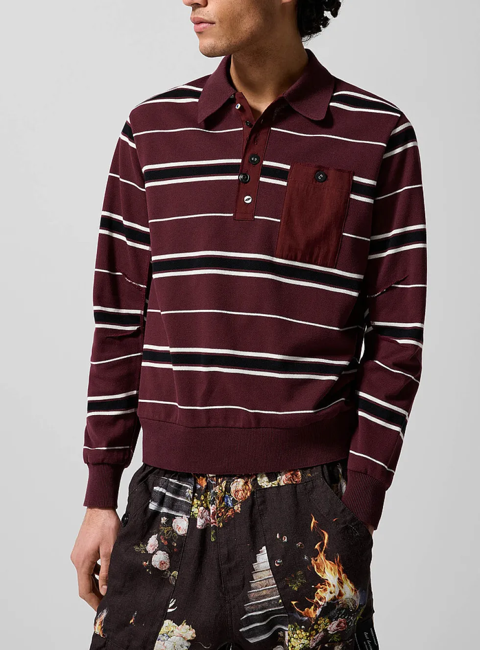 Mismatched-button rugby polo