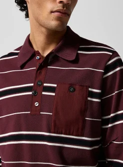 Mismatched-button rugby polo