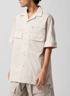 Multipocketed technical fabric cabana shirt