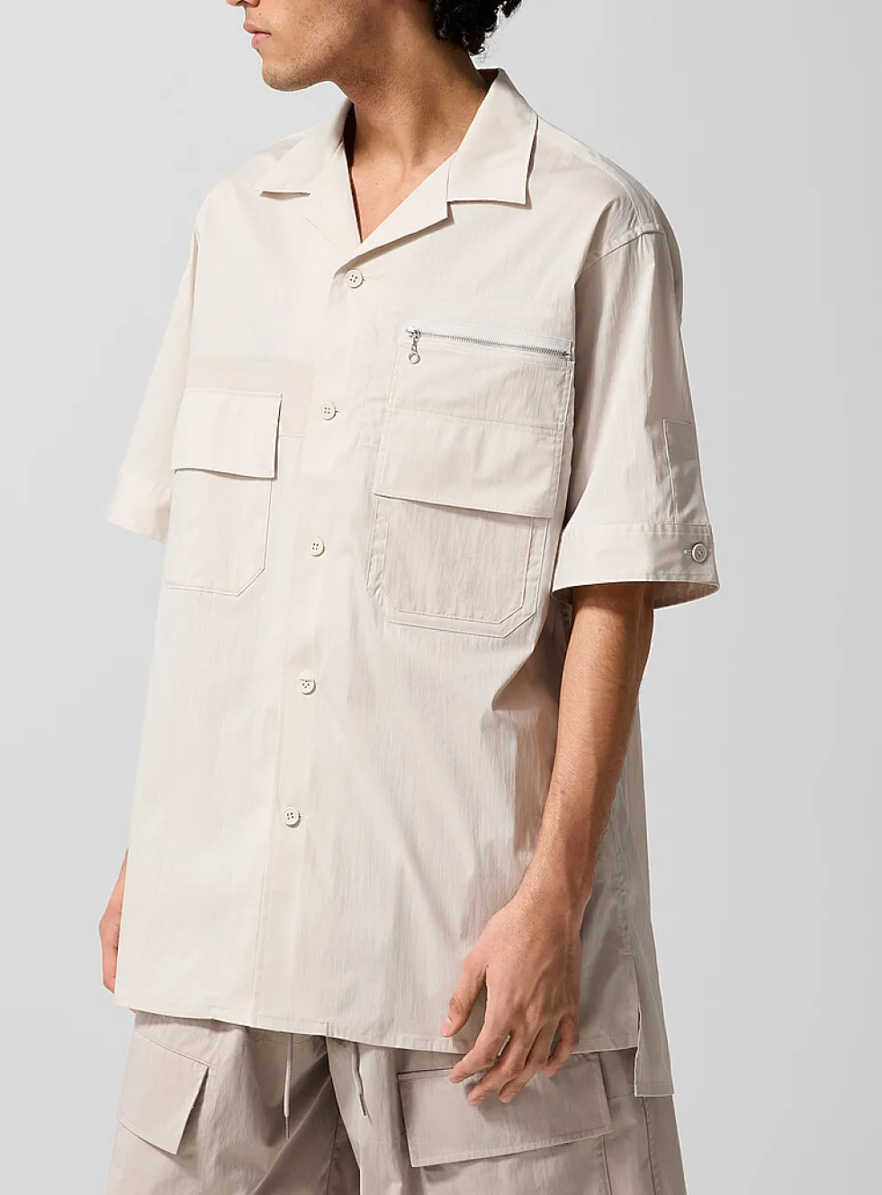 Multipocketed technical fabric cabana shirt