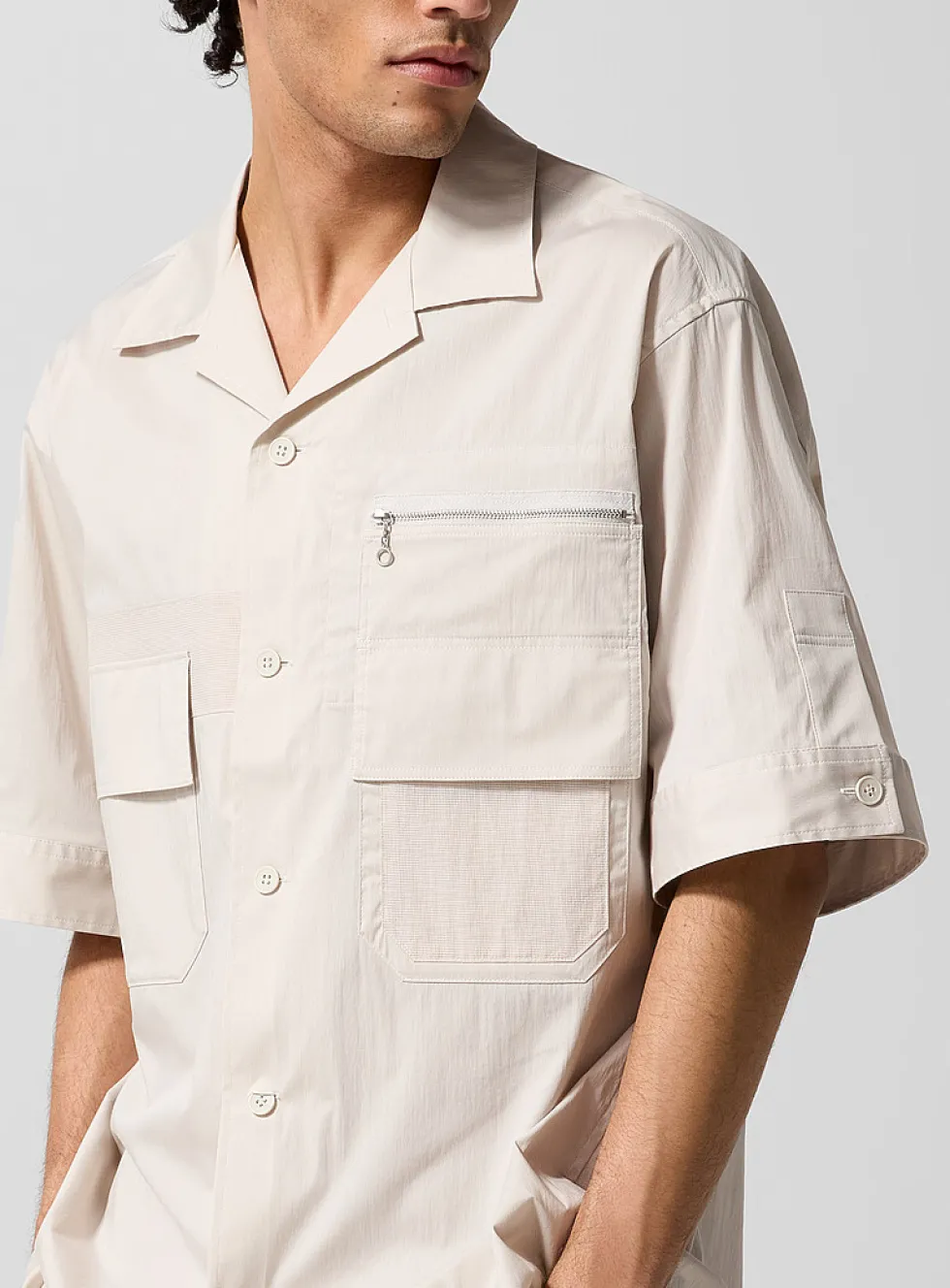 Multipocketed technical fabric cabana shirt