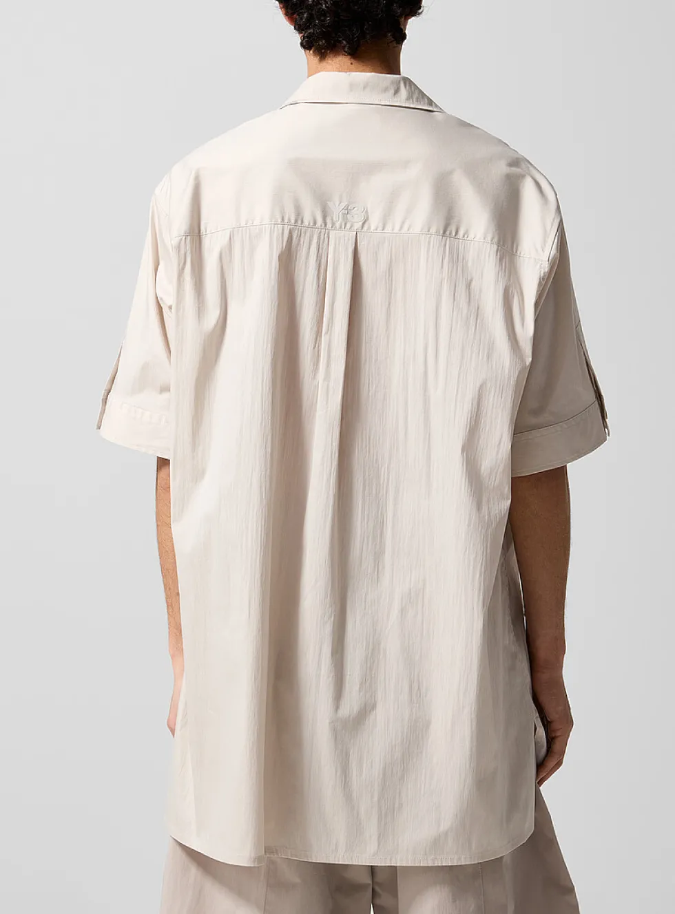 Multipocketed technical fabric cabana shirt