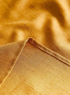 Mustard yellow textured tablecloth