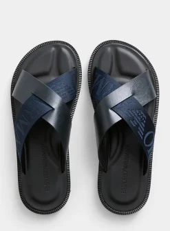 Navy blue leather crossed-strap sandals