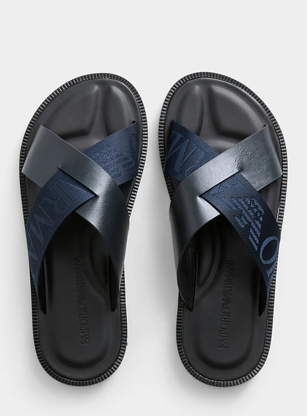 Navy blue leather crossed-strap sandals