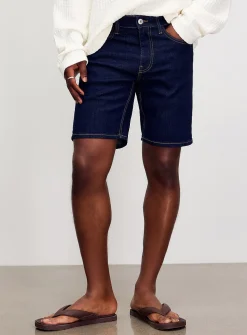 Ochre topstitch indigo jean Bermudas