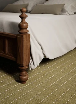 Oliver topstitched lines handcrafted rug