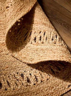 Openwork detail round braided jute rug