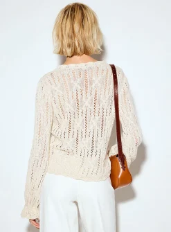 Openwork knit tie-up cuffs sweater
