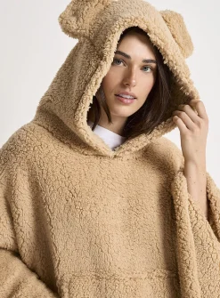 Oversized faux-shearling poncho with ears