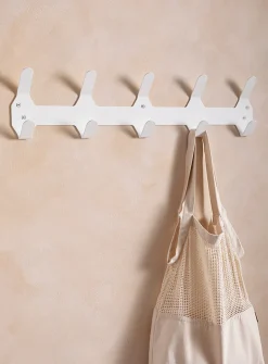 Painted aluminum monochromatic wall-mounted coat rack
