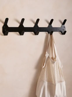 Painted aluminum monochromatic wall-mounted coat rack