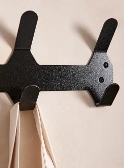 Painted aluminum monochromatic wall-mounted coat rack