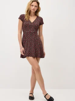 Patterned crossover minidress