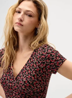 Patterned crossover minidress