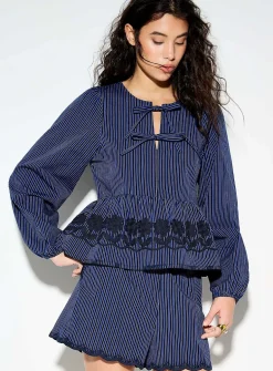 Peplum waist puff-sleeve blouse