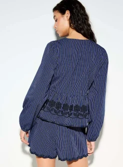 Peplum waist puff-sleeve blouse